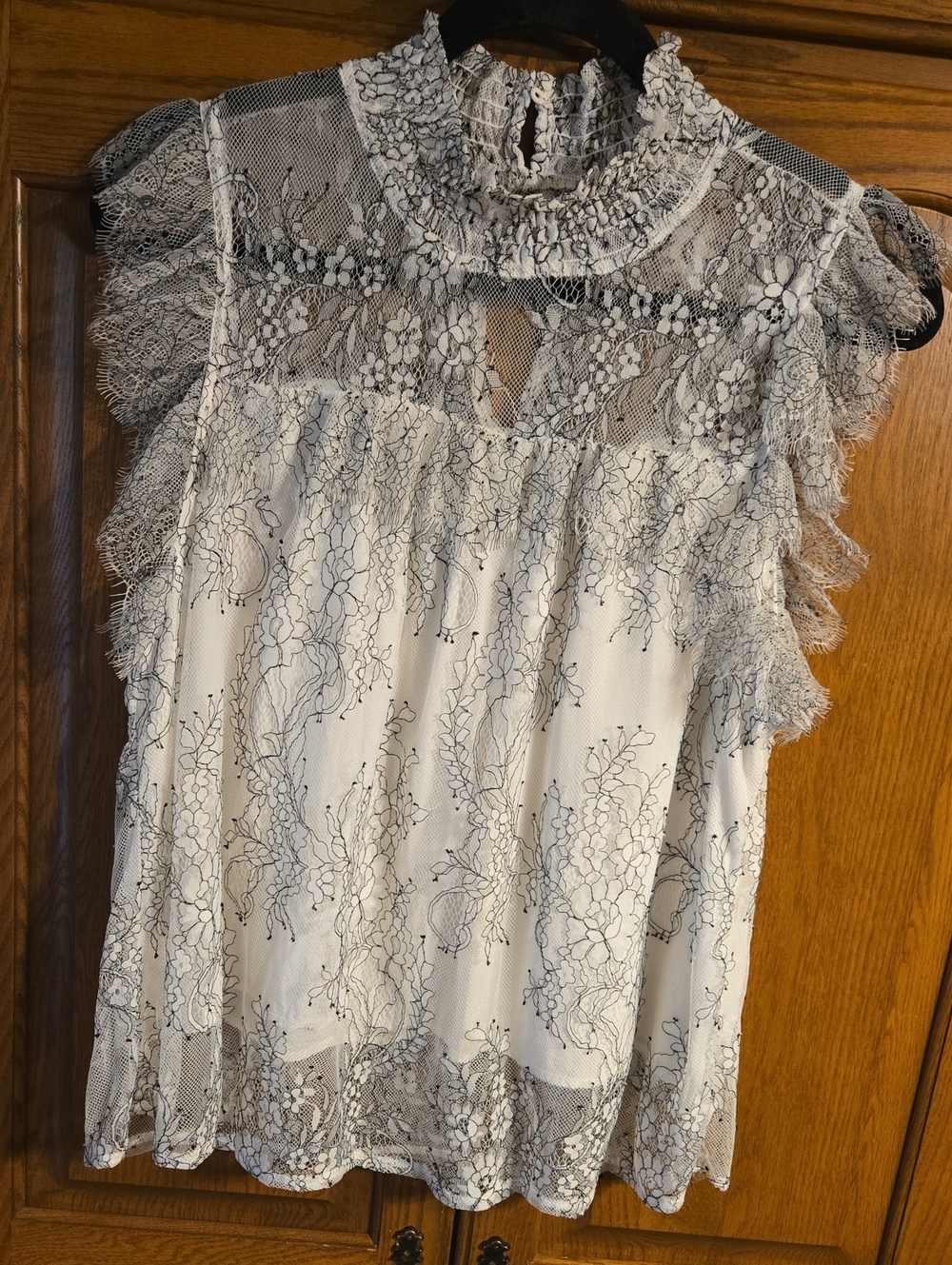 Elegant White Lace High-Neck Sleeveless Blouse